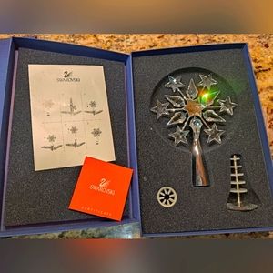 Swarovski retired crystal tree topper or stand.